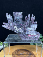 Load image into Gallery viewer, Crystal sculpture of a hand with an owl on a clear stand against a dark background
