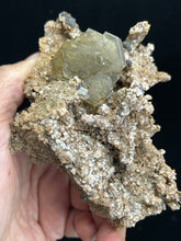 Load image into Gallery viewer, Golden barite in matrix from Peru w/ crystal info card
