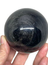 Load image into Gallery viewer, 67mm Silver Sheen Obsidian sphere protection R70T with crystal info card
