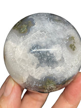 Load image into Gallery viewer, 56 mm Moss Agate sphere ZF69 with druzy and crystal info card
