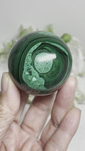 Load and play video in Gallery viewer, 45mm Malachite sphere with crystal info card Z24
