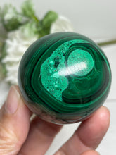 Load image into Gallery viewer, 45mm Malachite sphere with crystal info card Z24

